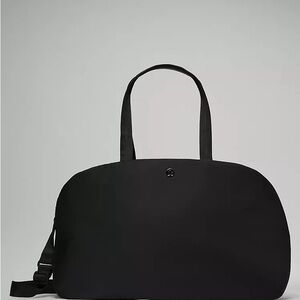 Lululemon Athletica Black Travel Bag with Minimalist Design